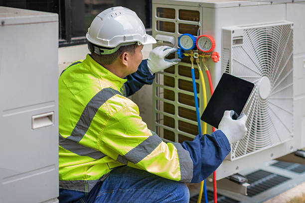 Professional Ac Installation technician working in Canton, MA